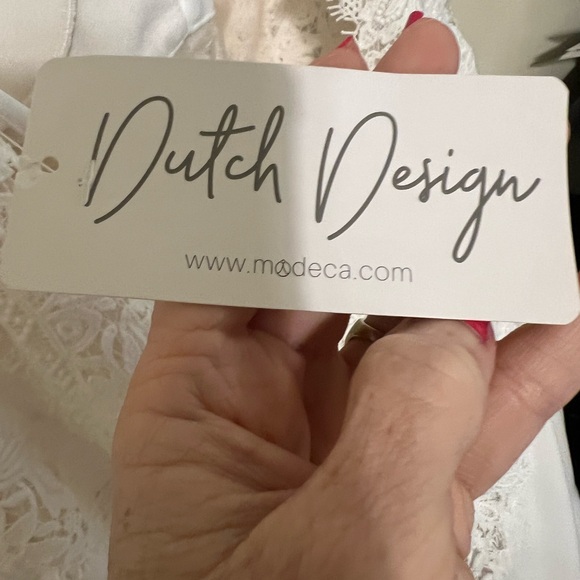 New wedding dress. Only tried on. No alterations have been done to this item. - Picture 8 of 9